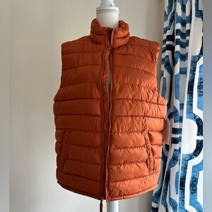 Old navy men’s puffer vest, new with tags, size L, color orange